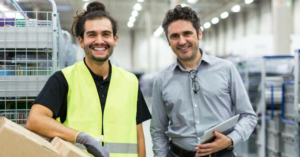 smiling warehouse workers