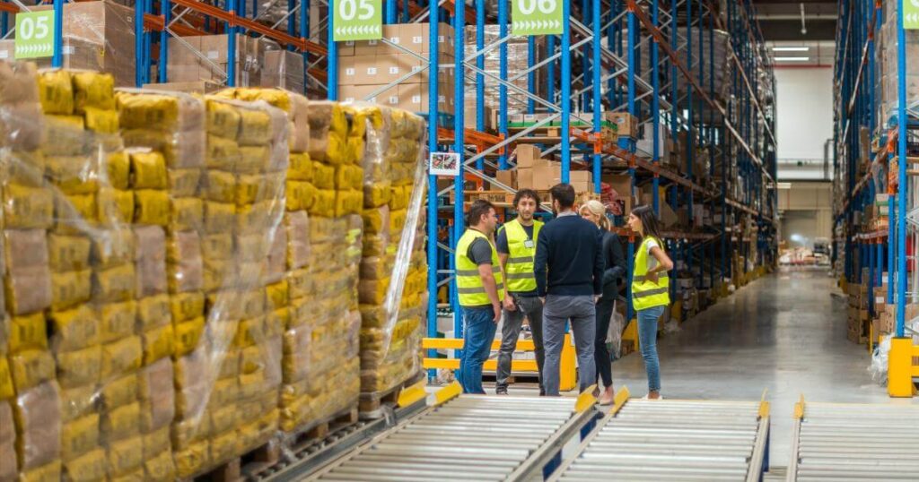 warehouse staff meeting after ICE business raid